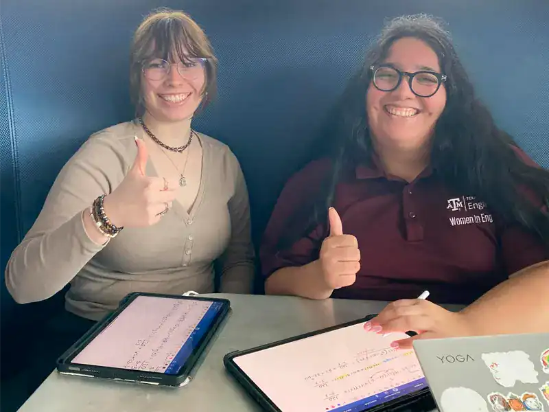 Alex tutoring a Texas A&M student in person Bryan College Station